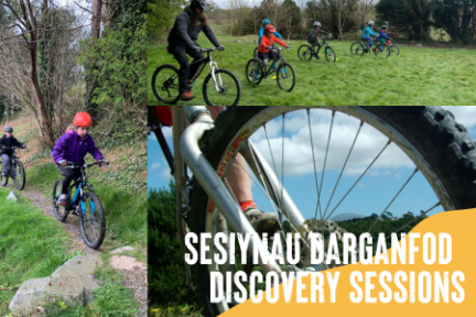 a person riding a bike down a dirt road