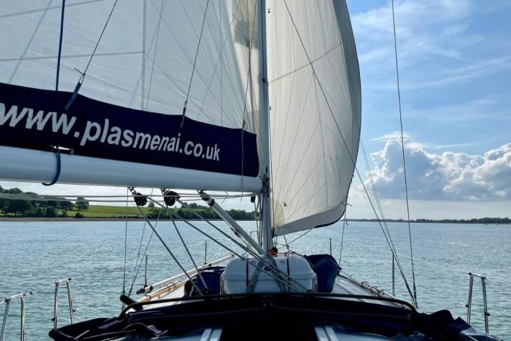 a boat is docked next to a body of water