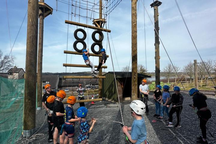 a group of people around each other