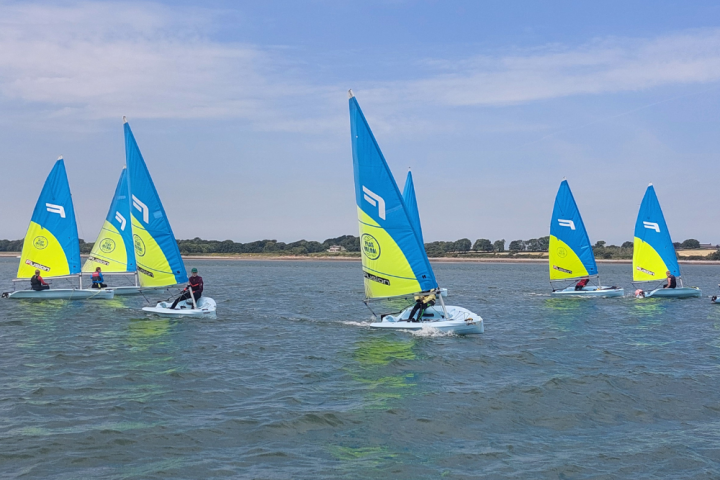 a group of people on a boat in a body of water