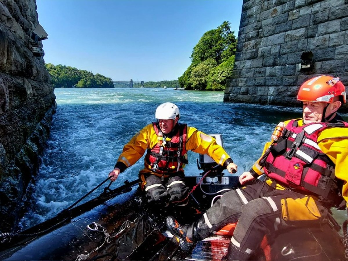 a man in a raft on the water