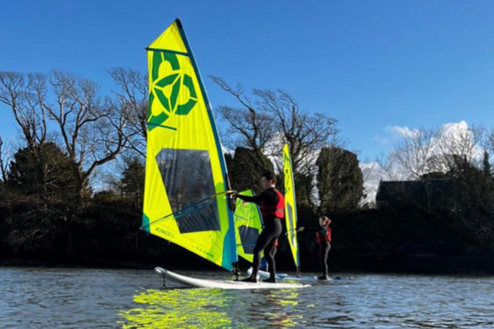 a small boat in a large body of water