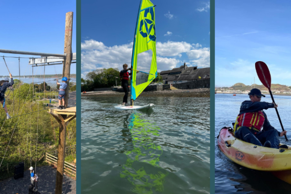 People engaged in various water sports like sailing, kayaking, and paddleboarding.